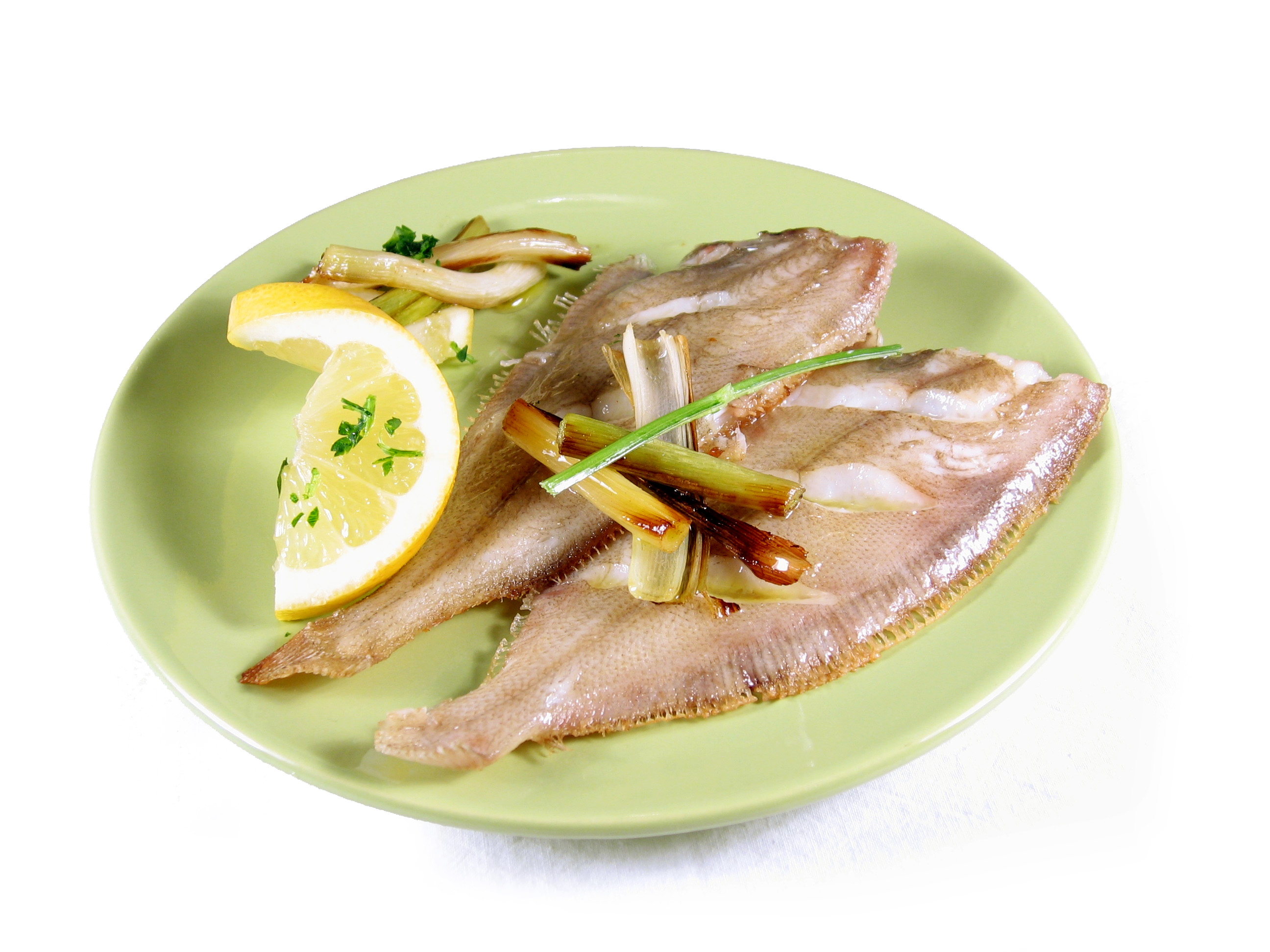 Rapante á prancha con limón e allos tenros salteados