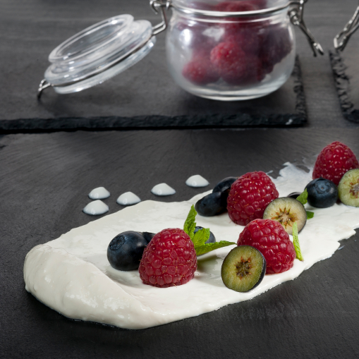 Crema de queso, frutos rojos y balsámico