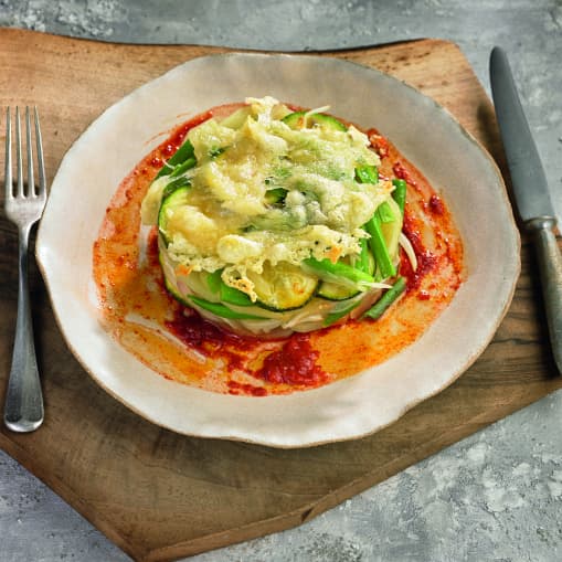Lasaña de patata rellena de rehogado de verduras