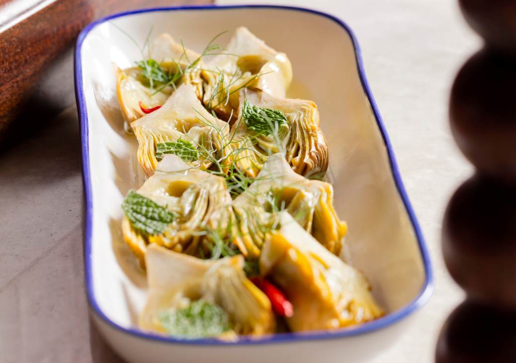 Alcachofas con escabeche de hierbas